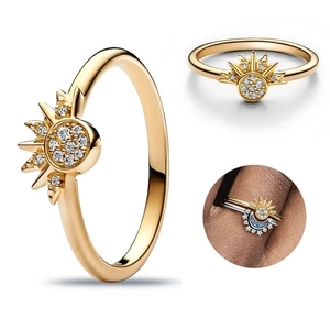 Golden sun-shaped S925 silver ring set with micro-diamond pavé and boho rays design