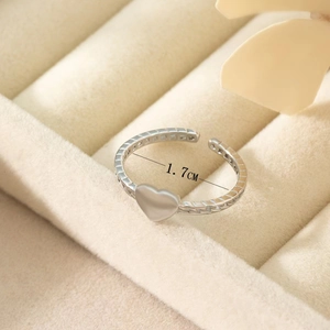 Minimalist S925 sterling silver adjustable heart ring with textured band in jewelry box