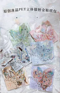 Macro detail of PET butterfly stickers with laser gold holographic effects and 3D textures