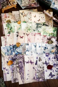 Λεπτομέρεια από vintage χαρτί scrapbooking με πεταλούδες και λουλούδια για διακόσμηση