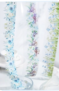 Macro detail of PET floral tape strips featuring snowy garden flower landscape designs
