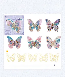 Detail view of 3D laser gold butterfly stickers showing realistic patterns and textures