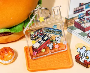 Macro detail of DIY house-shaped acrylic pendant with burger shop theme and glitters