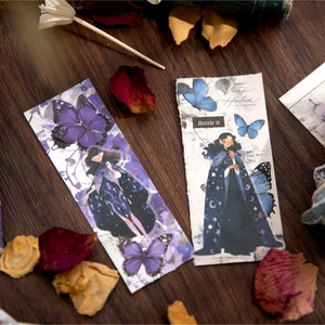 Vintage Butterfly & Girl scrapbook stickers with floral motifs on rustic wood background