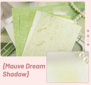 Detailed view of textured art paper with embossed floral and star patterns for DIY crafting