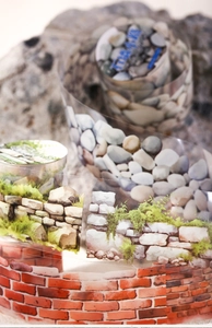 Macro view of PET tape featuring realistic stone wall and red brick textures for DIY crafts