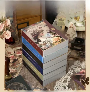 Vertical stack of 6 vintage scrapbooking paper pads featuring French hand-drawn illustrations