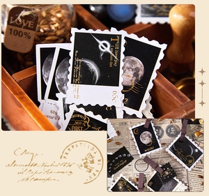 Macro detail of vintage astronomical stamp stickers with moon and galaxy patterns