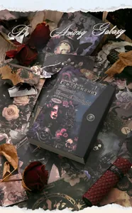 Macro view of Gothic themed scrapbook paper with dark red roses and vintage aesthetic