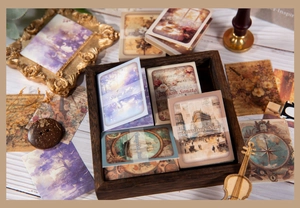 Λεπτομέρεια από vintage χαρτιά scrapbooking σε ξύλινο κουτί με σχέδια Λίμνη των Κύκνων