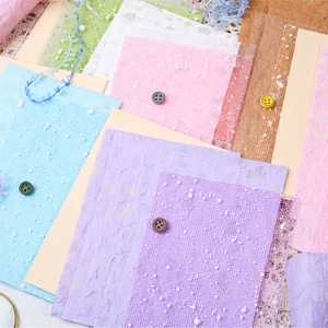 Kit de scrapbooking vintage con papeles de fibra texturizados, malla decorativa y botones