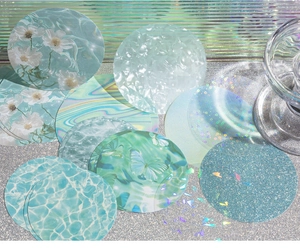 Close-up of holographic star-themed decorative paper stickers with shimmering foil effects