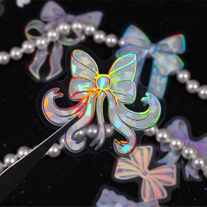 Autocollant nœud laser iridescent pour scrapbooking avec motif diamant sur fond noir