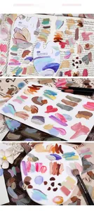 Macro view of transparent vintage palette stickers showing thick oil paint texture
