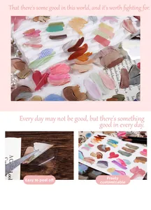 Macro detail of oil painting palette stickers with hearts for DIY journal decoration