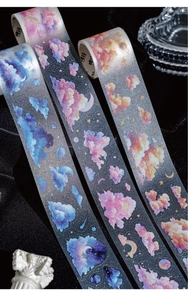 Detailed close-up of decorative PET tapes with starry sky and cloud patterns for DIY journals