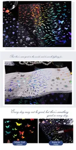 Detail of laser silver foil PET stickers with butterfly and snowflake patterns for journaling
