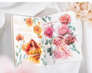 Close-up of vintage floral PET stickers and feminine characters on a journal page