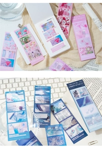 Close-up of artistic scenery stickers showing vintage landscape photos and quotes