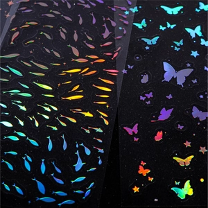 Holographic laser stickers set featuring stars and butterflies with rainbow PET finish