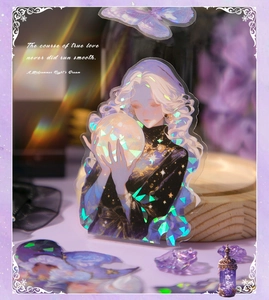 Close-up of holographic shell-light stickers featuring anime girl with mystical laser effects