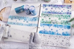 Detail of Snow Poetry PET tape showing winter snowflake patterns for DIY scrapbooking