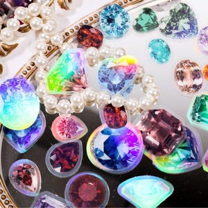 Holographic gemstone stickers in various shapes like heart and teardrop for scrapbooking