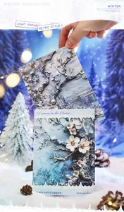 Λεπτομέρεια υφής ανάγλυφου σε vintage χαρτί scrapbooking με φλοράλ χειμωνιάτικα σχέδια