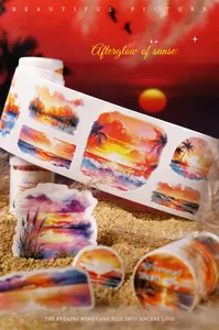 Macro detail of sunset watercolor washi tape set on sand with tropical beach illustrations