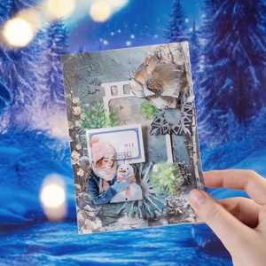 Carta decorativa a tema invernale con ragazza e pupazzo di neve in toni blu ghiaccio