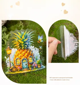 Close-up of waterproof PET fairy pineapple house stickers with transparent adhesive backing