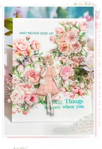Detailed close-up of pink floral PET stickers and anime girl collage for journaling