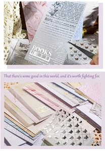 Macro detail of embossed vintage stickers with silver hot stamping and floral patterns