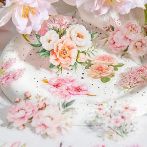 Pink garden floral PET stickers for scrapbooking and DIY crafts set on ceramic tray