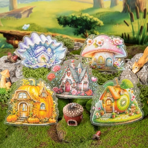 Fairy House DIY sticker set with shell, mushroom, and pumpkin cottage themes on moss decor