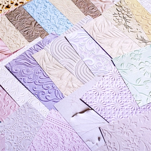 Retro embossed paper set with multi-color floral textures and decorative vintage patterns