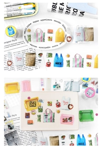 Detail van PET-stickers met supermarkt thema's, boodschappentassen en fruitmanden op journals