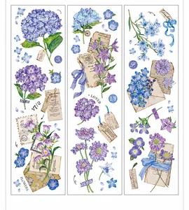 Macro shot of vintage watercolor floral PET tape stickers with envelopes and ribbons