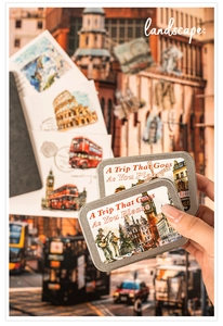 Handheld vintage British travel themed tin box with Big Ben and bus illustrations
