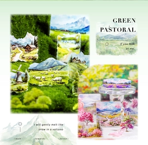 Macro detail of watercolor pastoral stickers featuring snowy mountains and green pastures