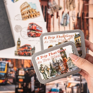 Portable vintage tin storage box with travel illustration stickers for scrapbooking