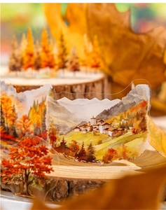 Detailed PET sticker showing watercolor forest landscape on a natural wood base