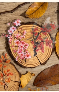 Macro detail of PET stickers featuring realistic hand-painted autumn leaves and cherry blossoms