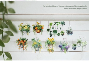 Detail of hanging plant stickers on white wood for DIY journaling decoration
