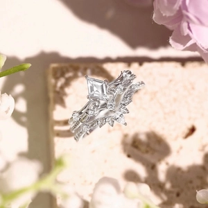 S925 sterling silver rhombus zircon leaf ring set on textured stone with floral background