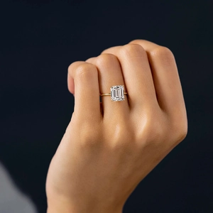 Minimalist S925 silver ring with emerald cut rectangle zircon on model's hand