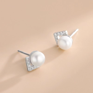 Minimalist S925 sterling silver V-shape stud earrings with white pearls and small diamonds