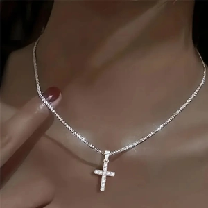 Elegant S925 sterling silver cross necklace with sparkling stones on a fine chain