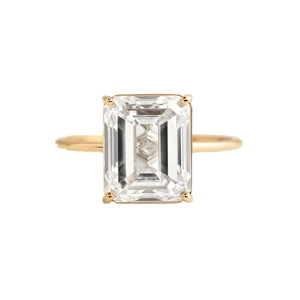 Elegant s925 silver gold plated ring with emerald cut clear zircon in a four-prong setting