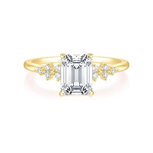 Elegant s925 silver ring with rectangular zircon in emerald cut and gold-plated finish